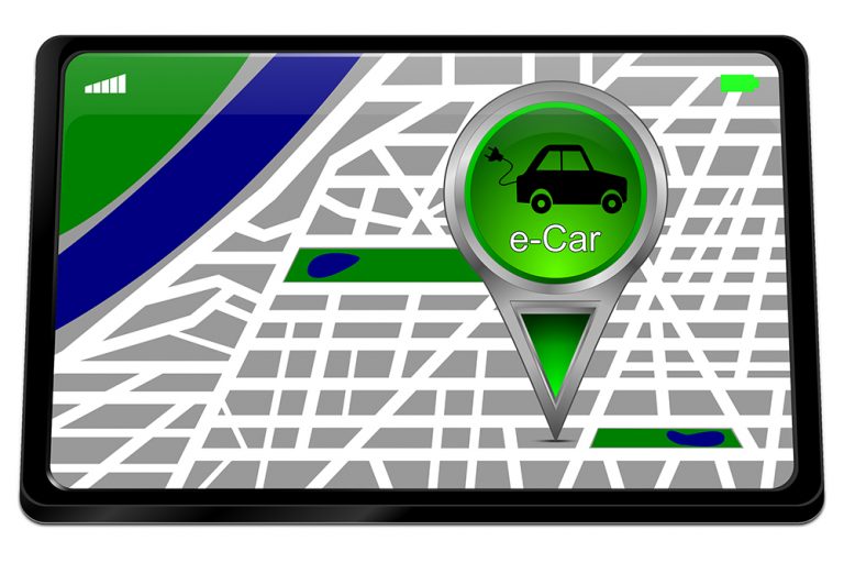 Inhalte Bilder Fotos Grafiken Vektoren Videos Tablet-Computer mit grünem E-Car Kartenzeiger - Illustration