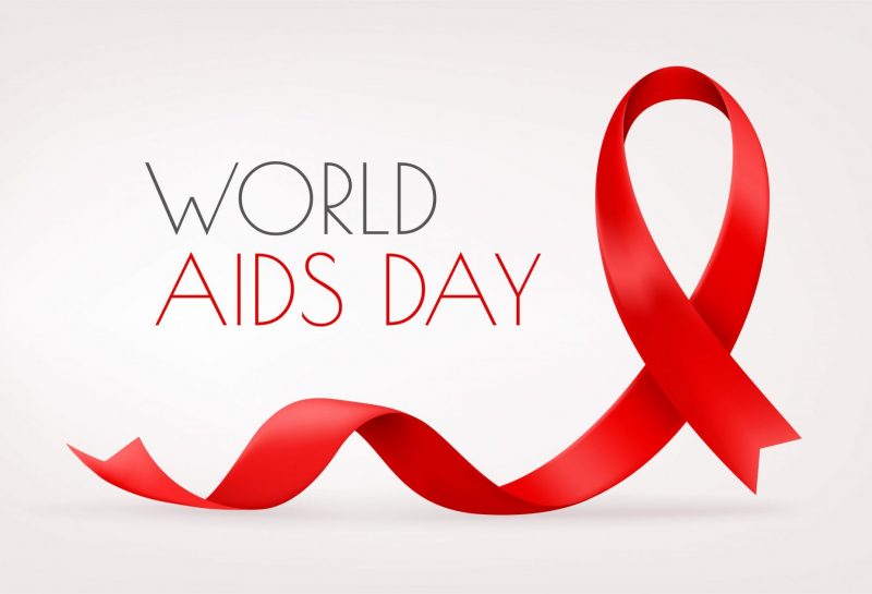 Schriftzug World Aids Day mit roter Schaufe